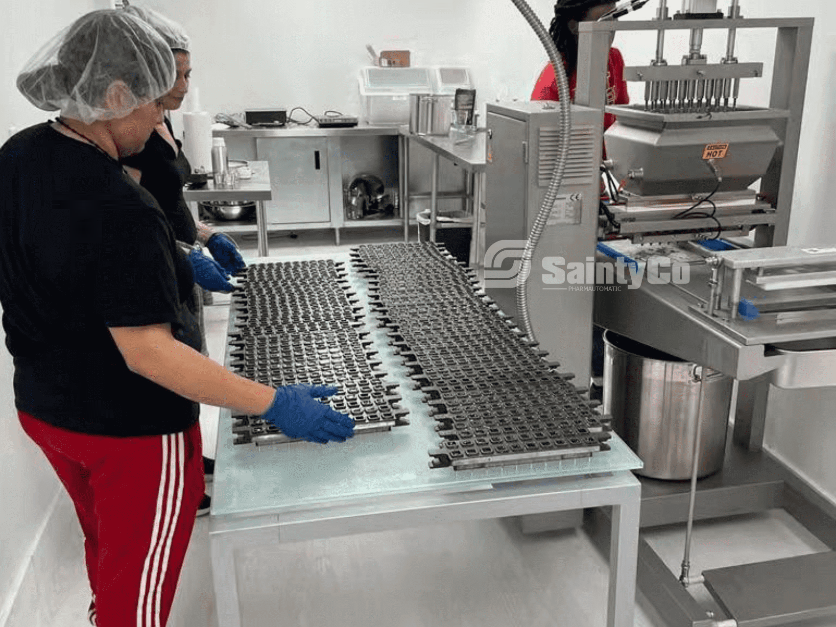 Metal molds for gummy production in a factory