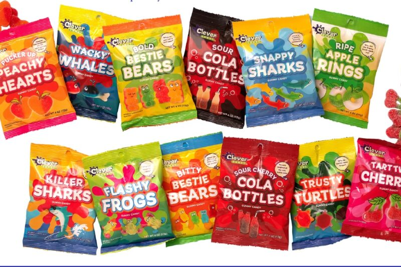 An assortment of colorful gummy candy packages from GummyGenix are arranged in a grid. Each package features a different type of gummy, including bears, cola bottles, peachy hearts, whales, frogs, sharks, apple rings, turtles, and cherries. The bright packages are adorned with playful designs.