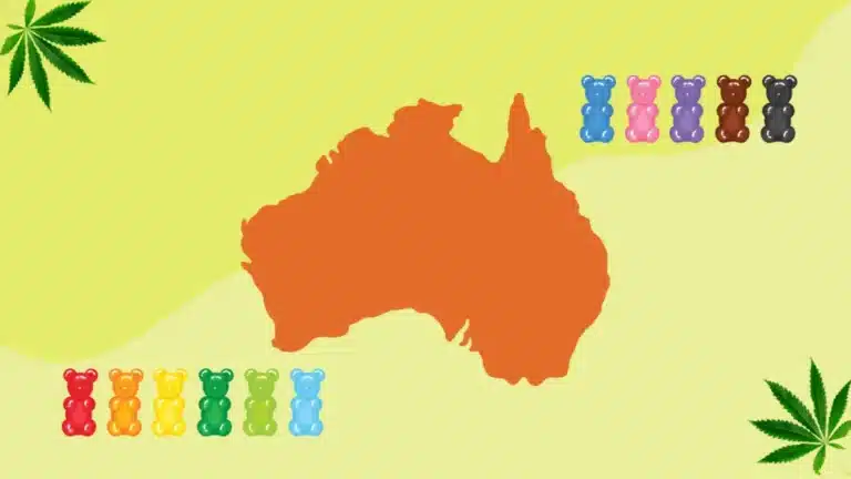 A map of Australia is surrounded by colorful gummy bears. On the left are red, orange, yellow, green, and blue gummies, and on the right are blue, pink, purple, brown, and black gummies. Cannabis leaves are in the top left and bottom right corners.